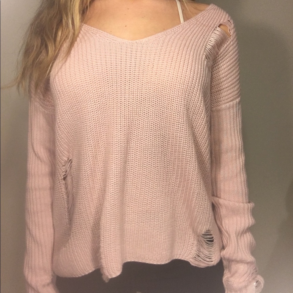 Pink ripped sweater